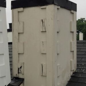 Old, Damaged Siding on Chimney