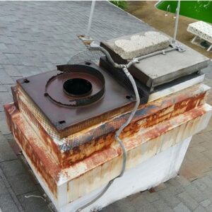 Weathered and Rusted Chimney Crown