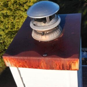 Rusted Metal Chimney Cap and Cover