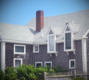 Red Brick Chimney on Wood Shake Home