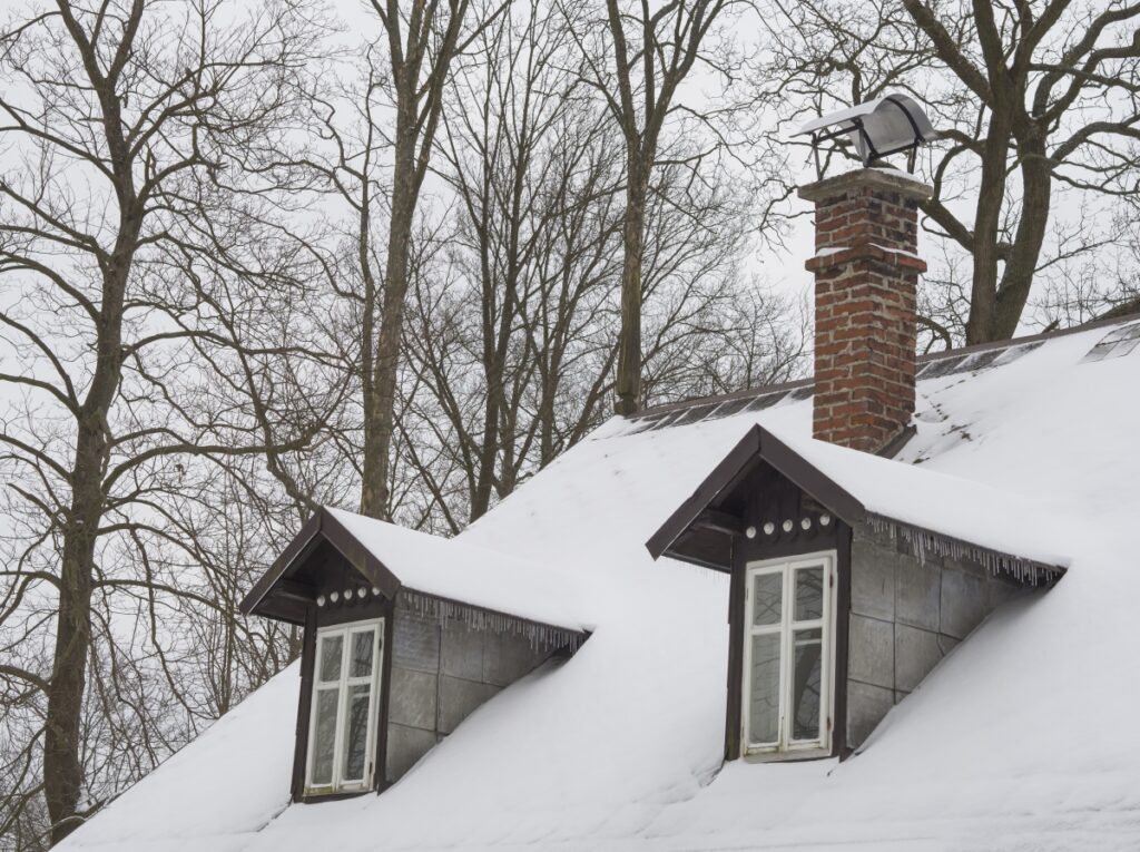 Chimney Atop a Snow-Covered Roof