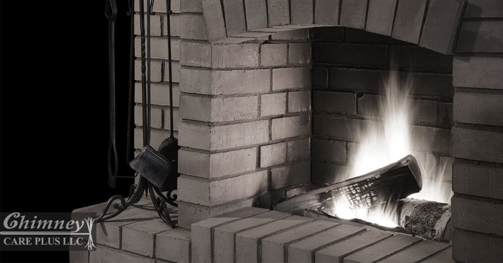 Fireplace With Logs on Fire