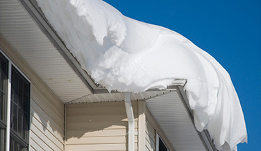 Snow Caked on a Roof