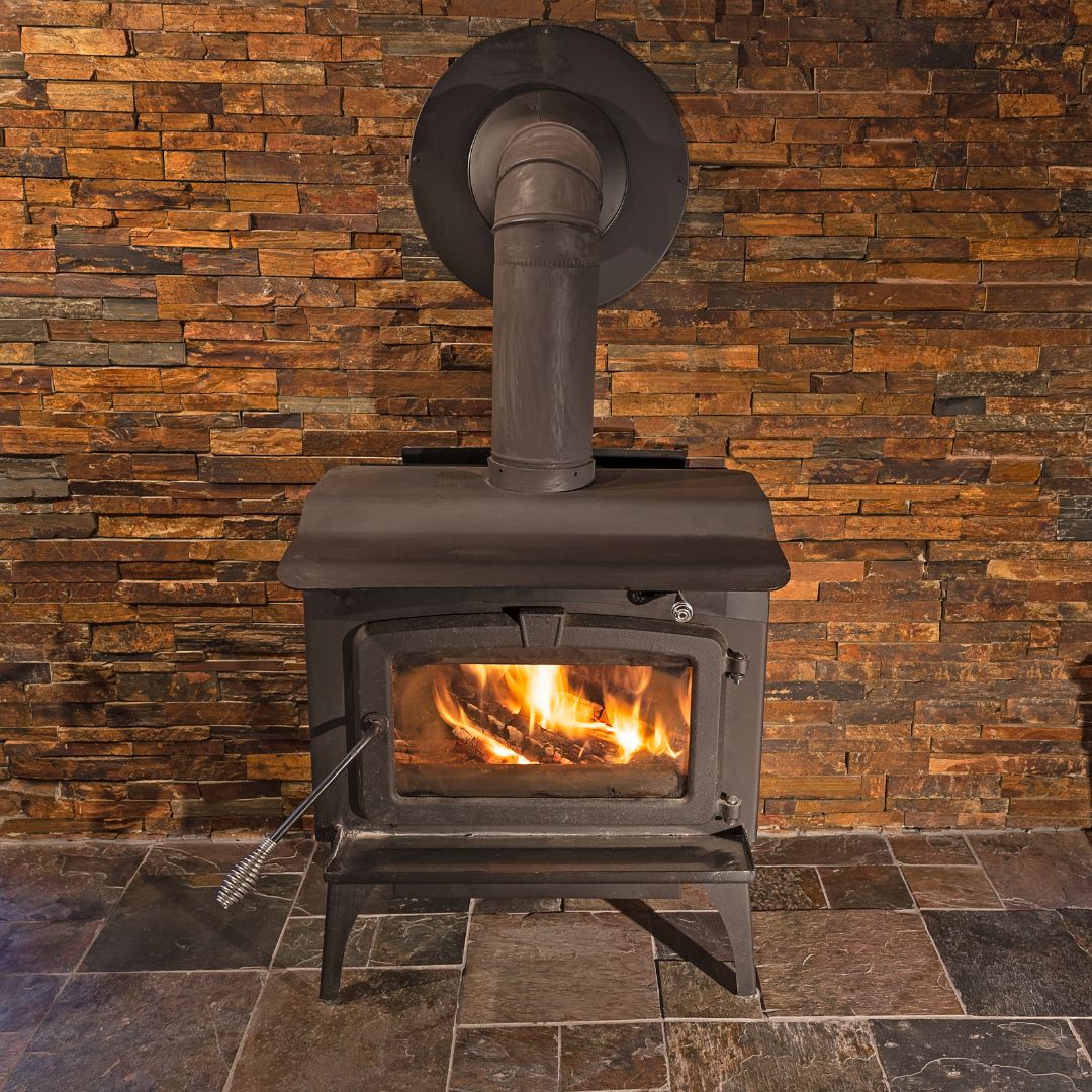wood-burning stove centered on wall