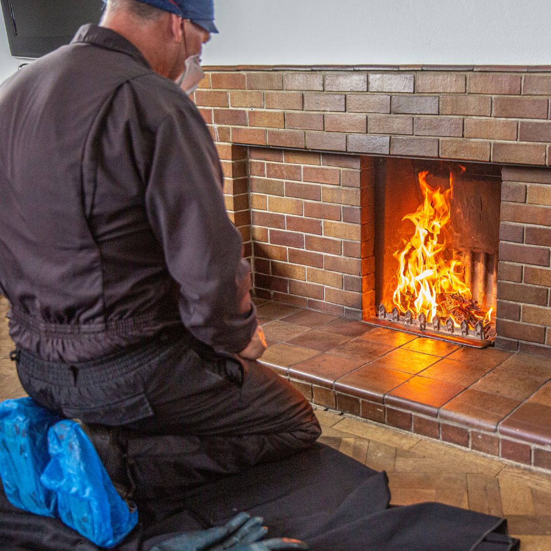 technician inspecting a fire