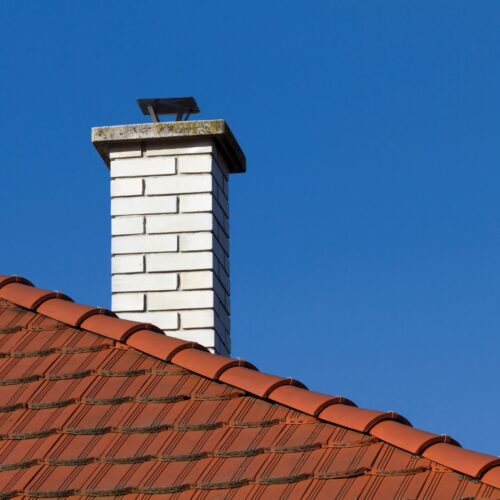 A chimney with a chimney cap