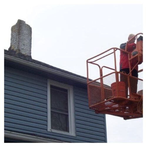 cherry picker going up to chimney