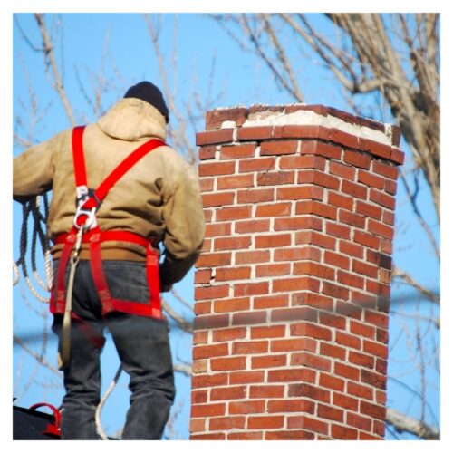 inspecting chimney on roof